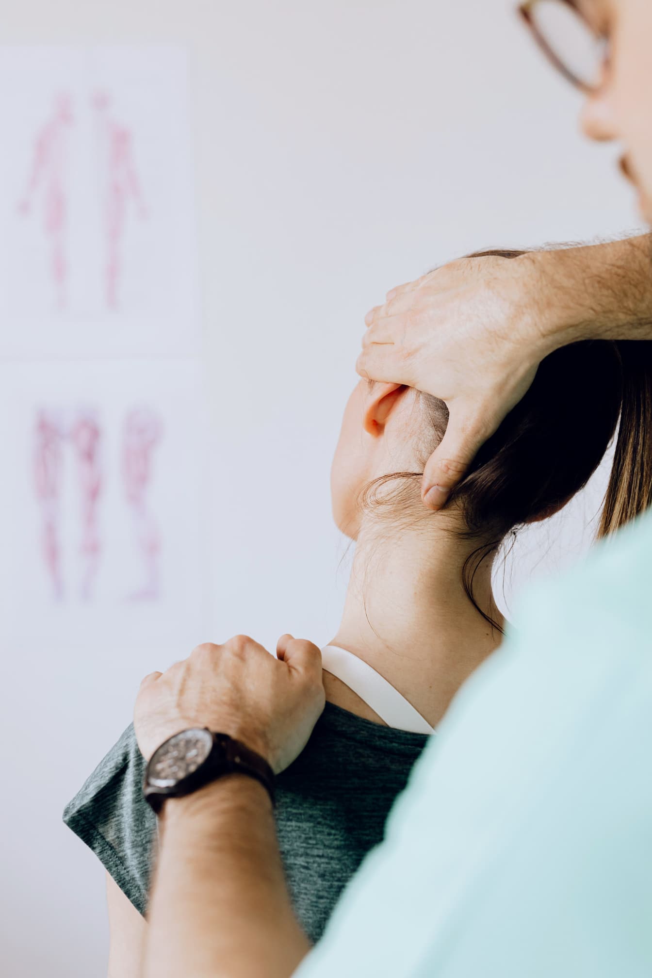 Chiropractor treating a patient