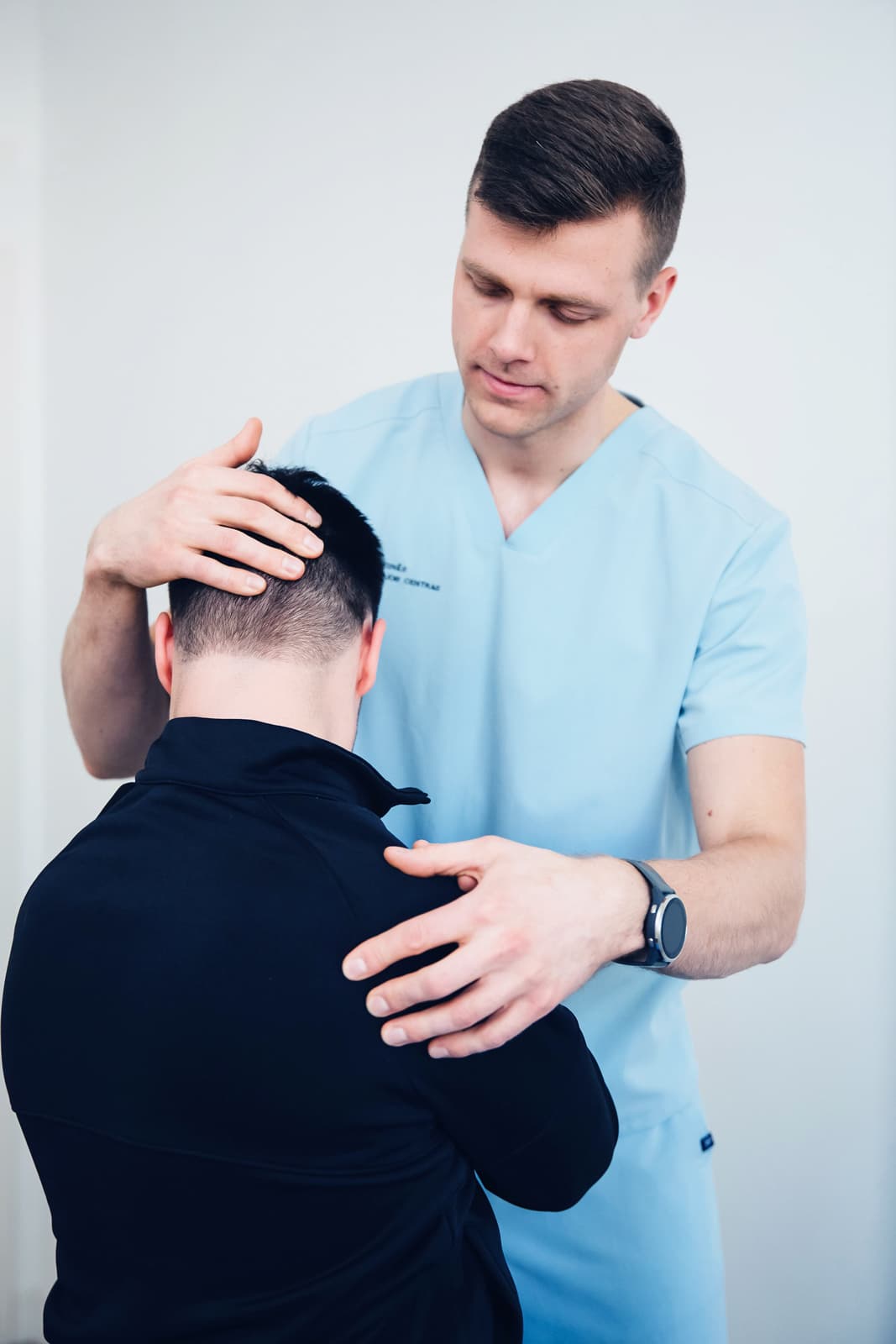 Osteopath treating a patient